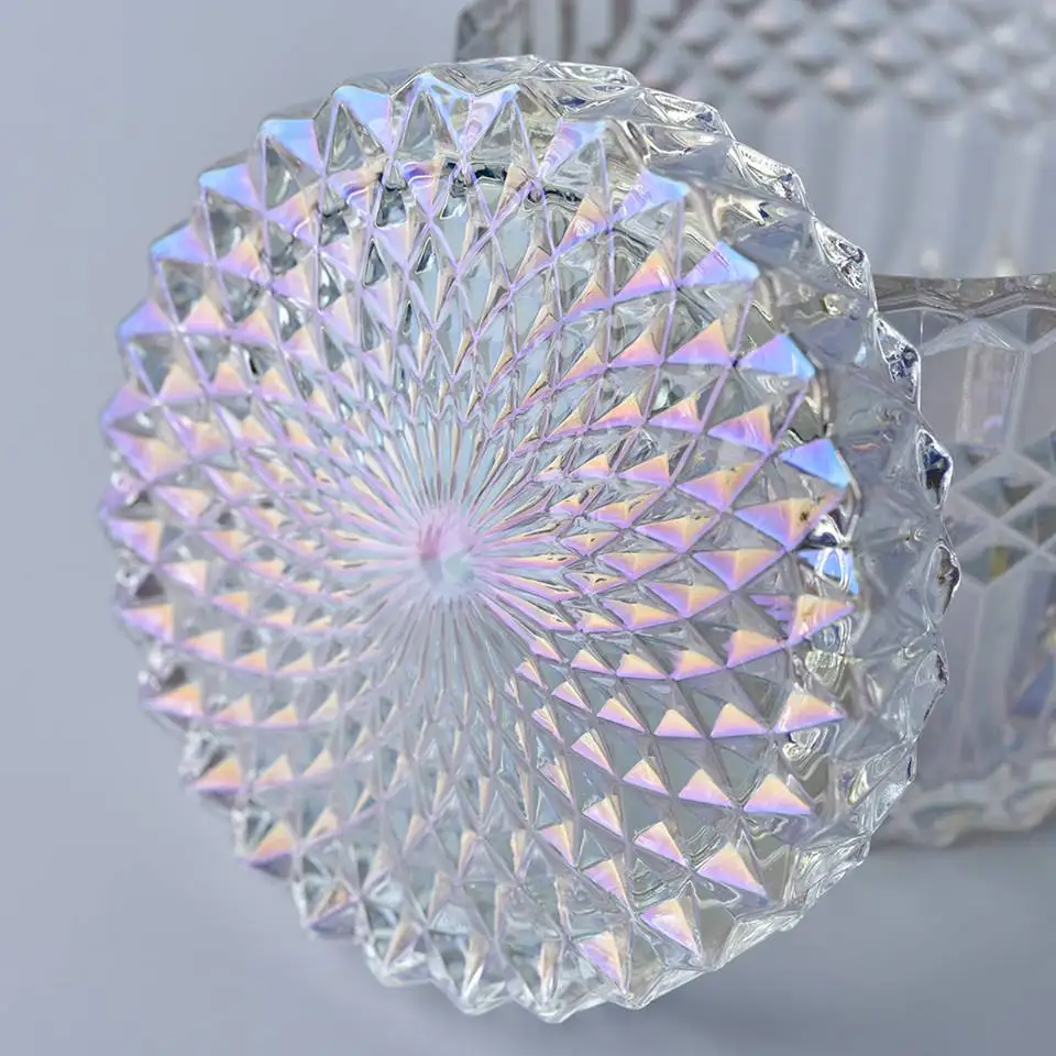 Iridescent geo-cut glass candle jars with lids and glass lids