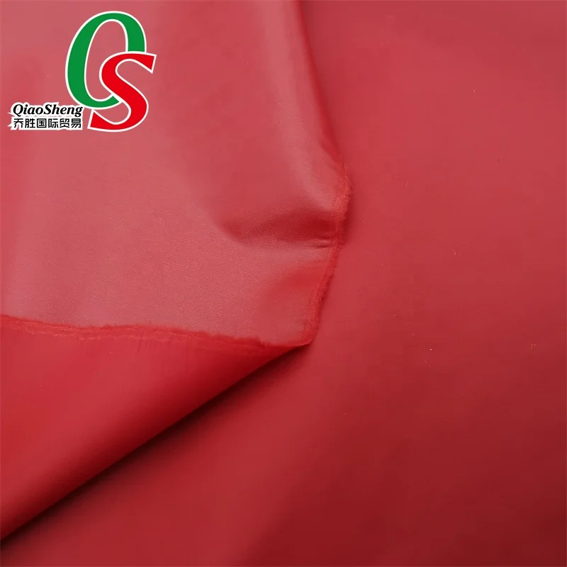 100%nylon downproof windproof water Repellent plain taffeta heavy cire oil calender fabric for down jacket warm cloth