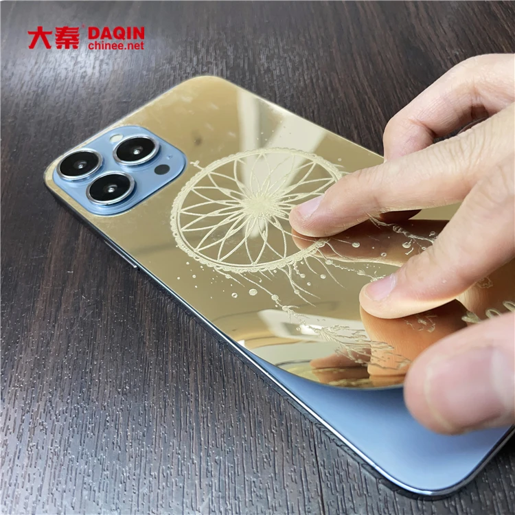 cut Gold engraved back skin by daqin laser screen protector Cutting machine