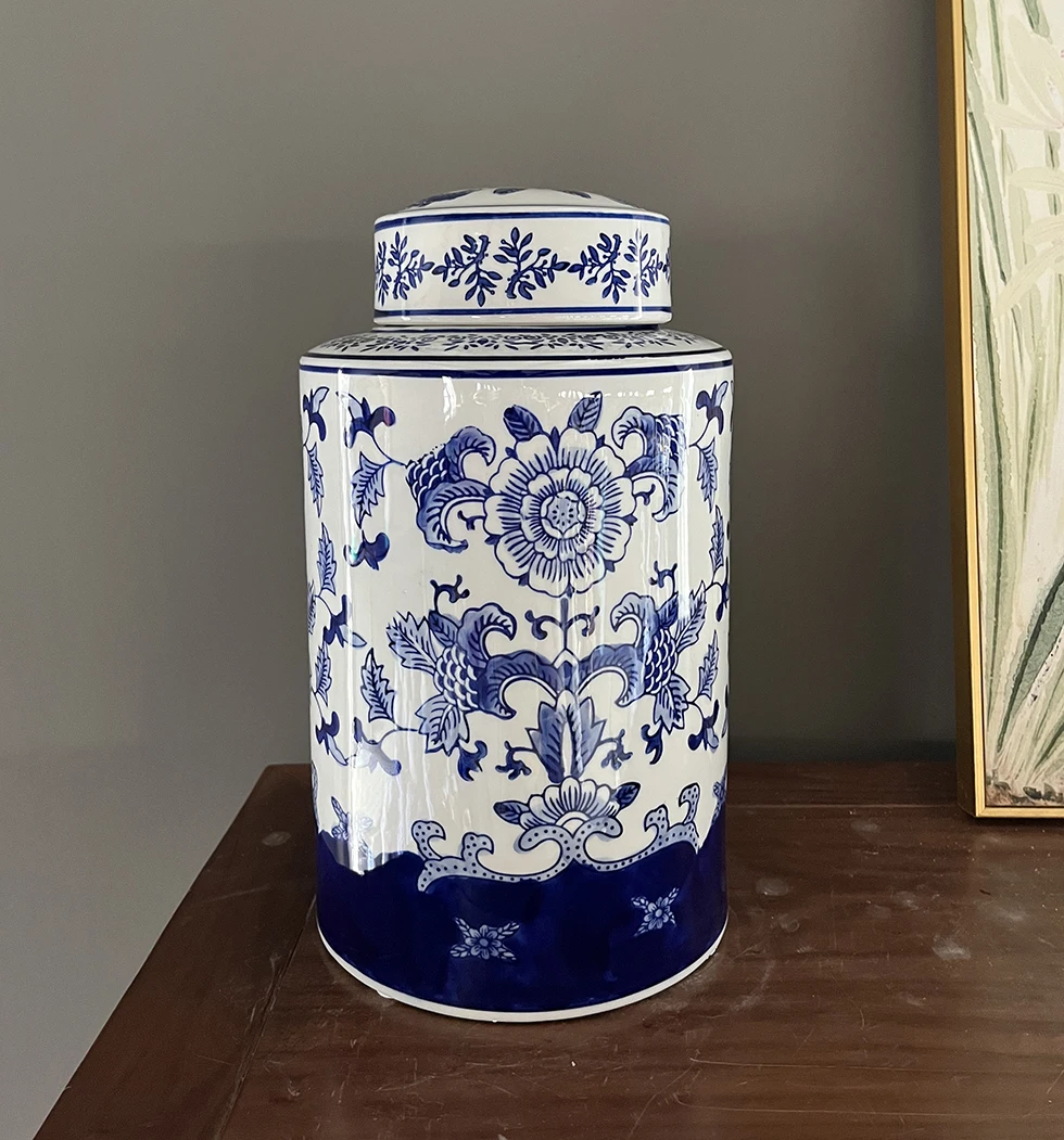 Porcelain Ginger Jar with Blue and White Peony Design A Dutch Delft blue and white baluster vase and cover