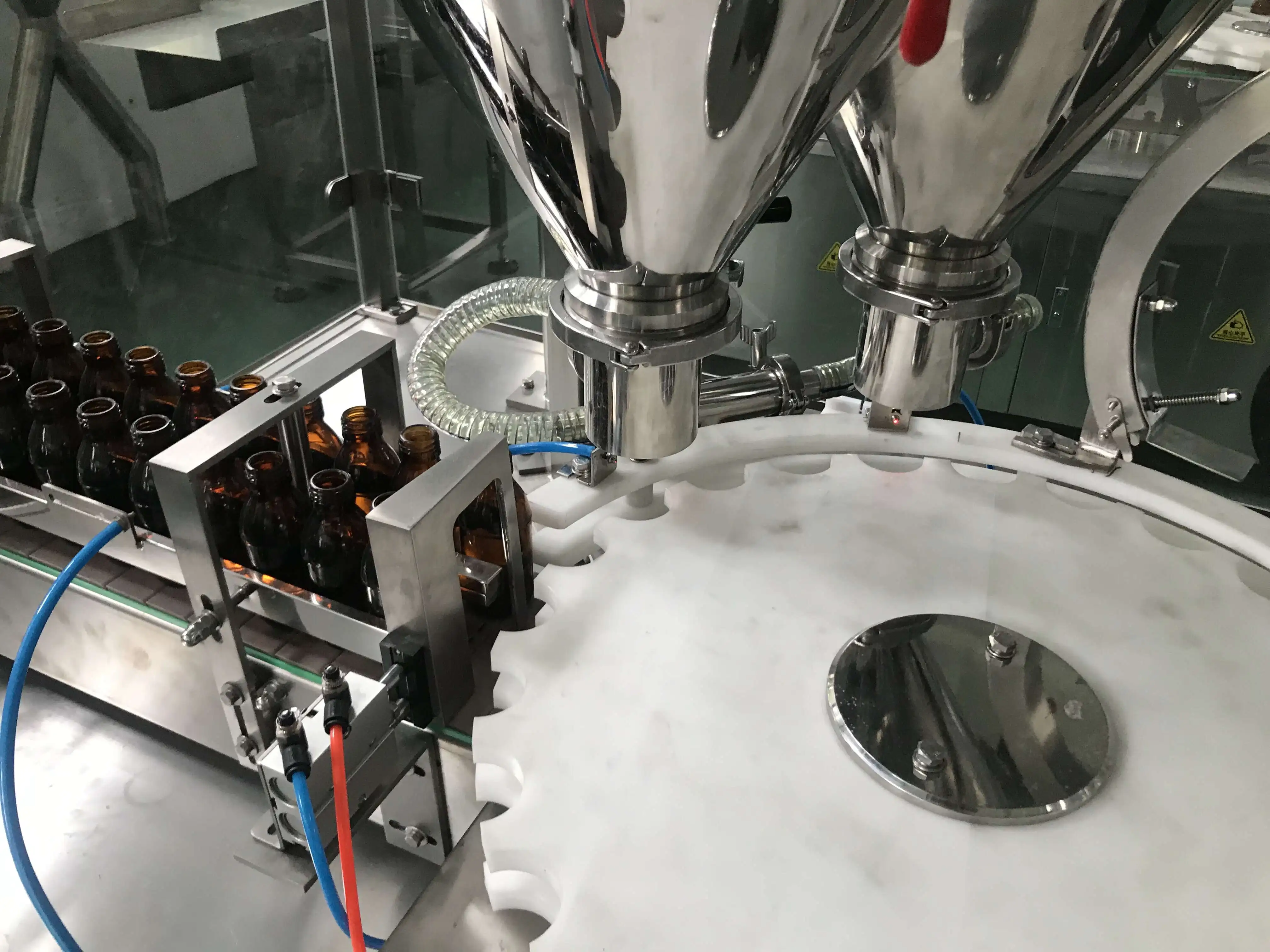 Glass bottle infusion stoppering and capping oral liquid filling line