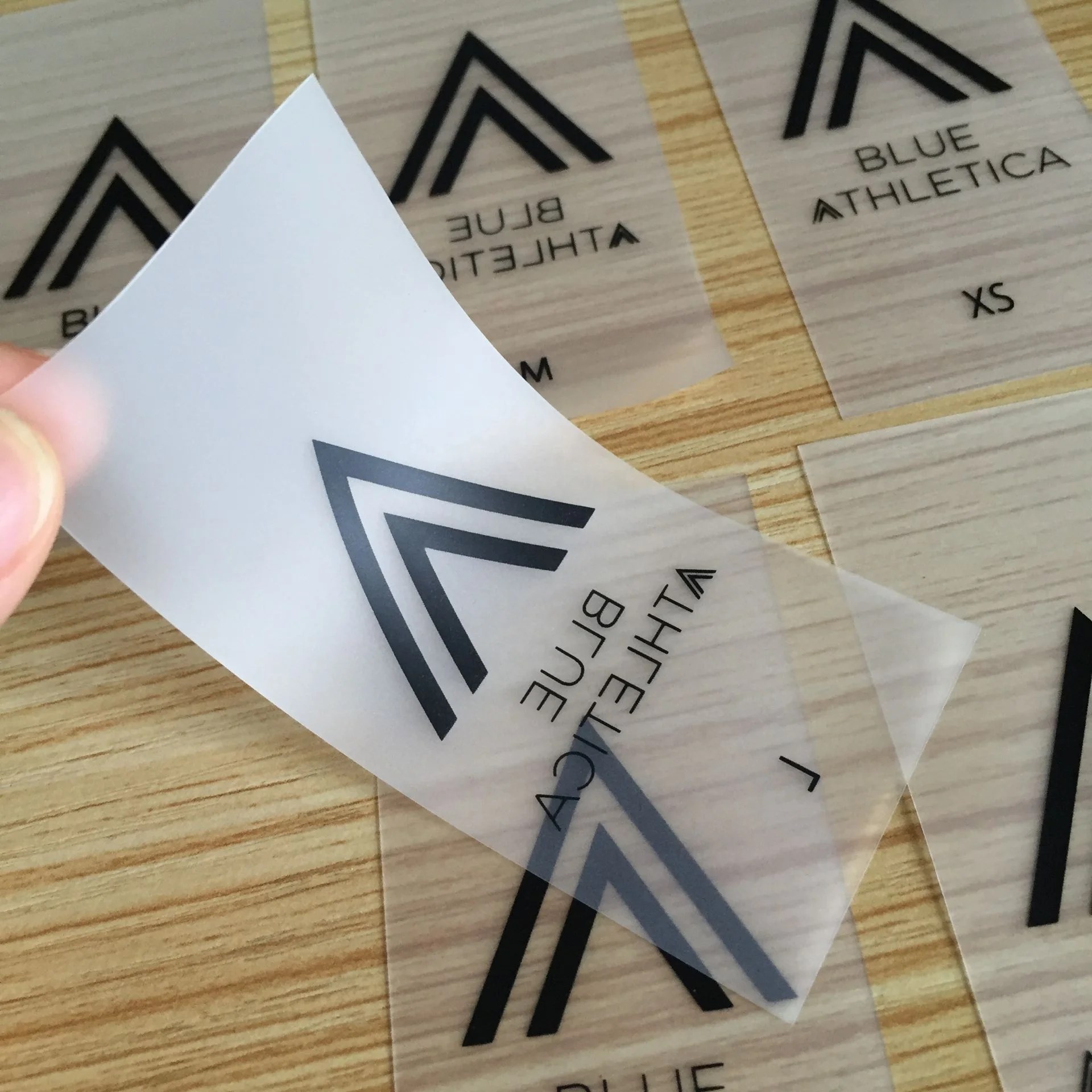 Размер логотипа на заказ, принт, водонепроницаемые мягкие спортивные штаны для йоги, шорты для фитнеса, одежда, прозрачная этикетка из ТПУ в одежде