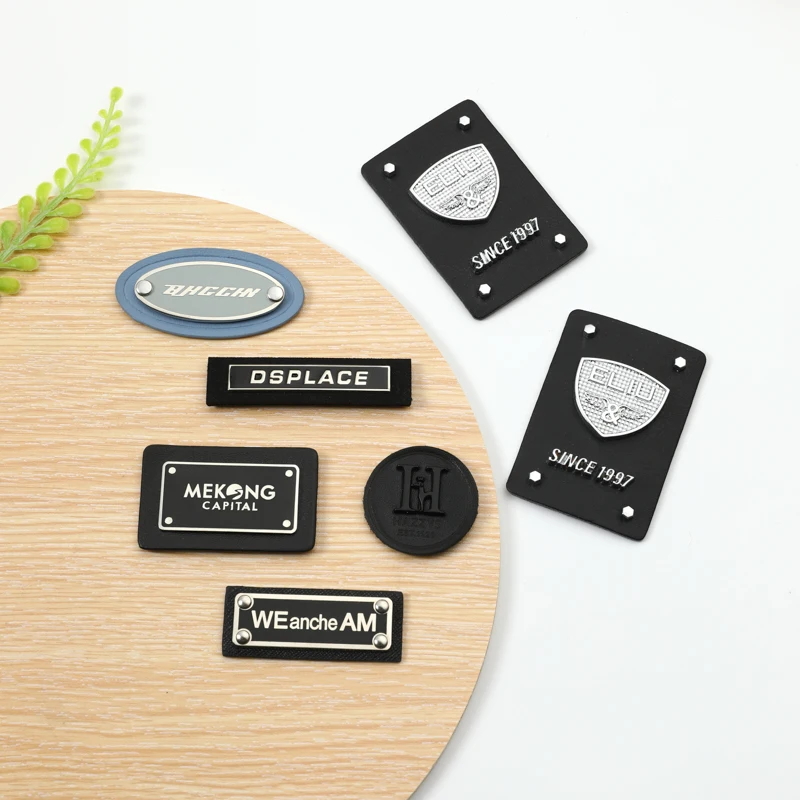 2024 good supplier metal logo labels with leather sewing label For Clothing Garment Metal Accessories