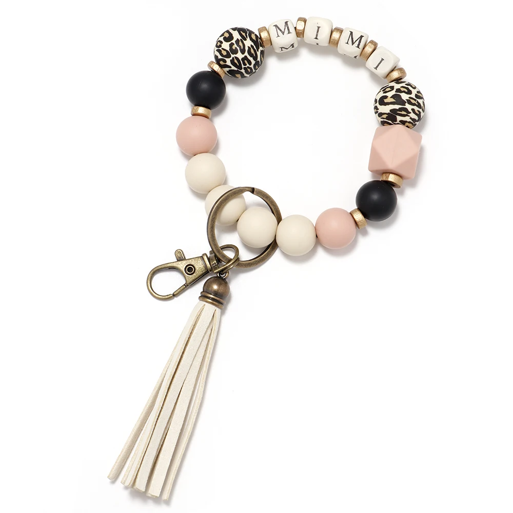 2022 Classic Popular Leather Tassel Wooden Bead Keychain Wholesale Bracelet Key Ring Silicone Bead Bracelet