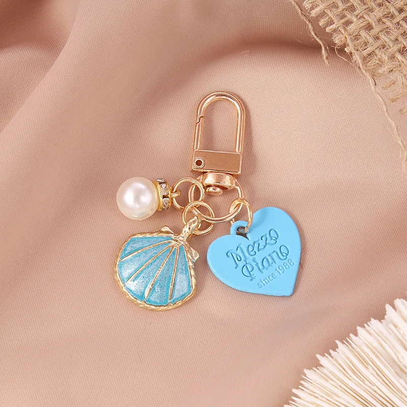 New starfish shell keychain pendant airpods case bluetooth headset case bag charm small gift keychain pendant