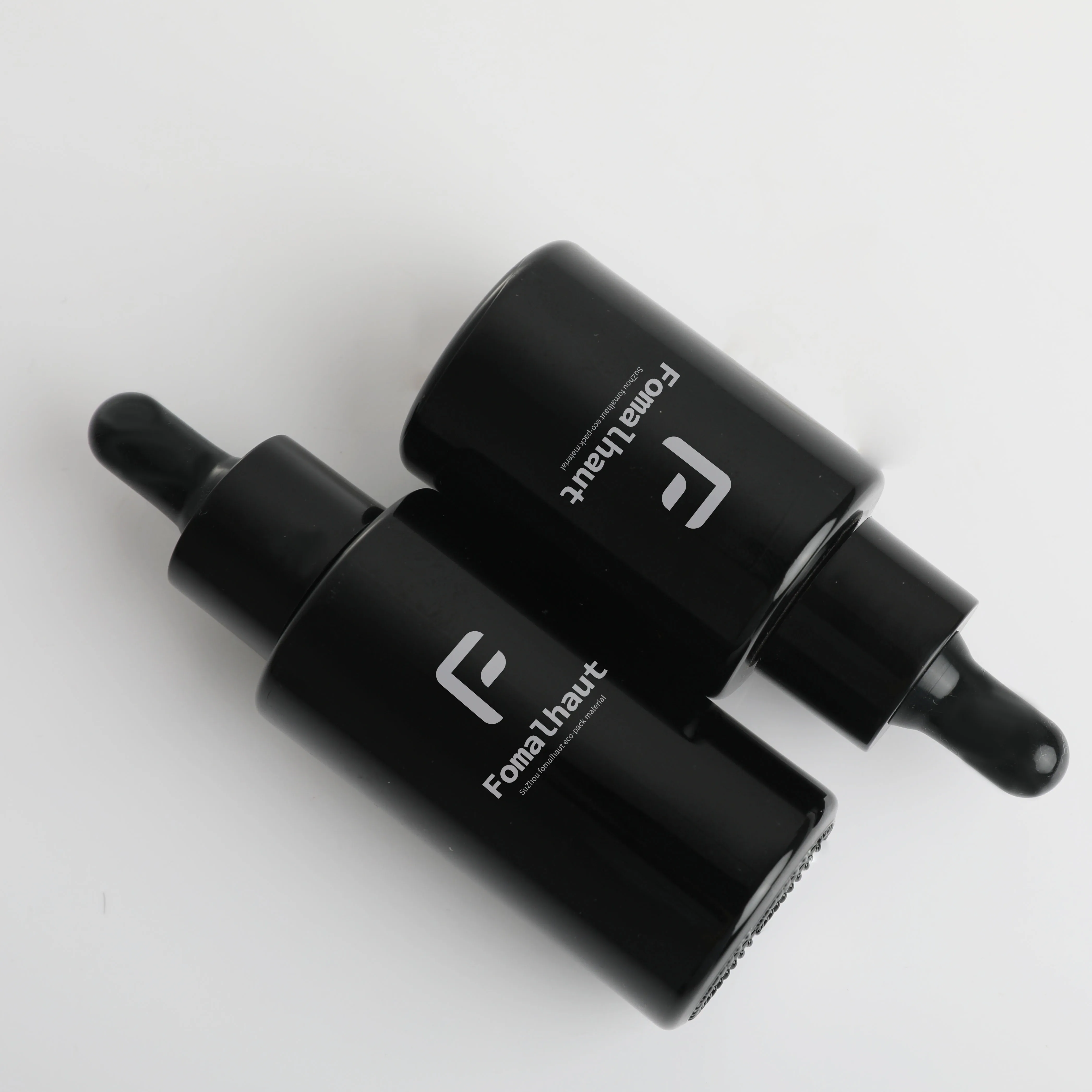 Fomalhaut  new product textured luxury 30ml 50ml 100ml pure black light forbidden glass dropper bottle for cosmetic