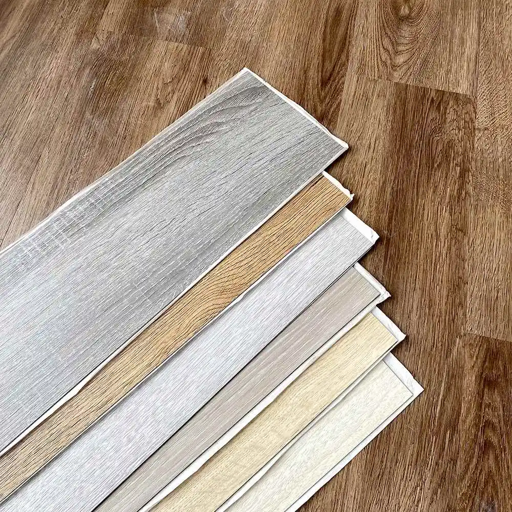Cheap Wholesale waterproof bathroom floor plastic tiles pvc adhesive vinyl plank floor flexible flooring