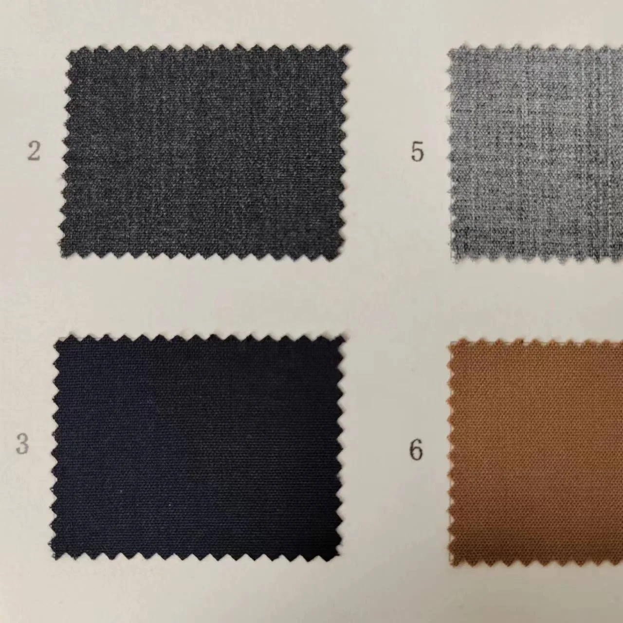 40% Wool 29% Polyester 28% viscose 275g/m spot worsted plain summer light stretch suit jacket wool fabric