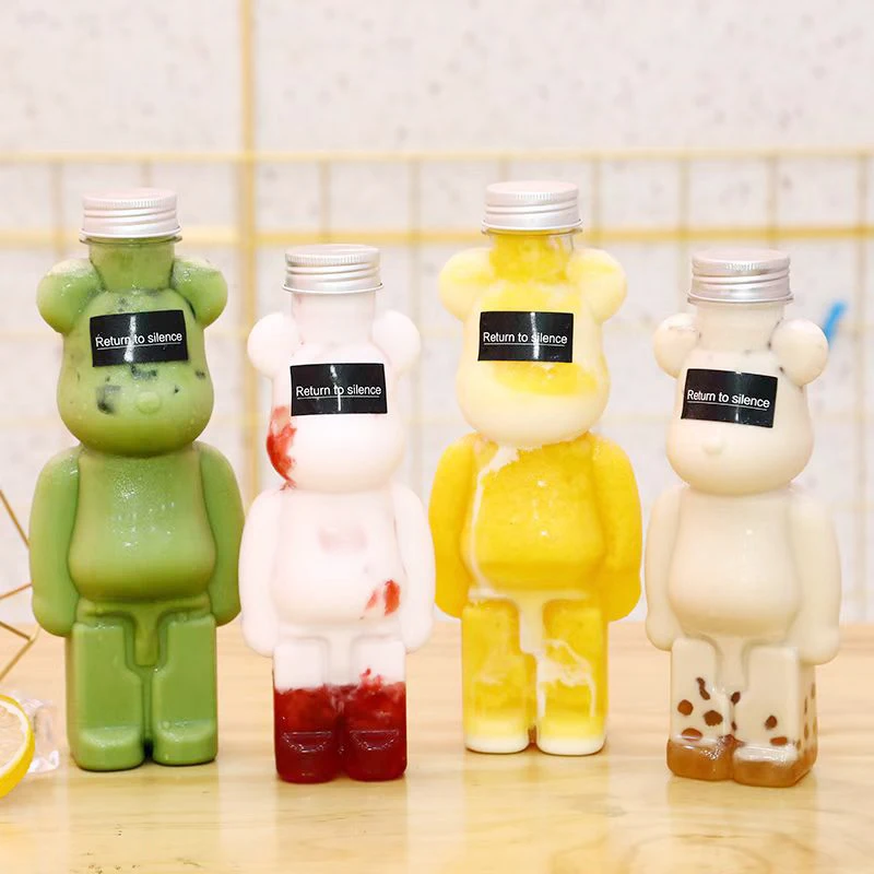 Custom Plastic Juice Bottle 400ml 500ml 13oz 16oz PET Beer Shape Plastic Beverage Bottle for milk tea juice With Cap