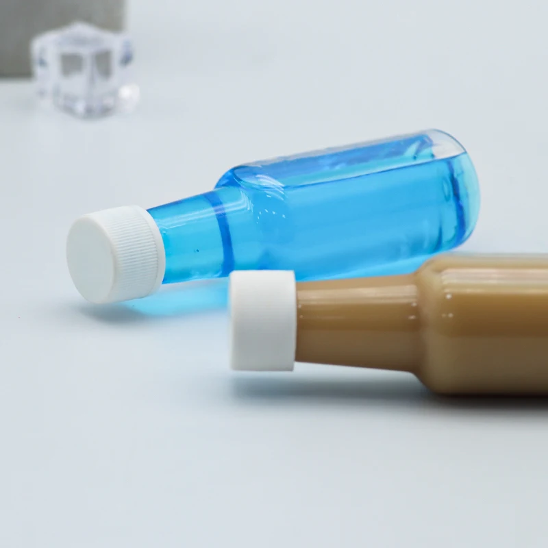 Wholesale 50ml Wine shape PET clear plastic bottle for coffee juice liquor Bottle