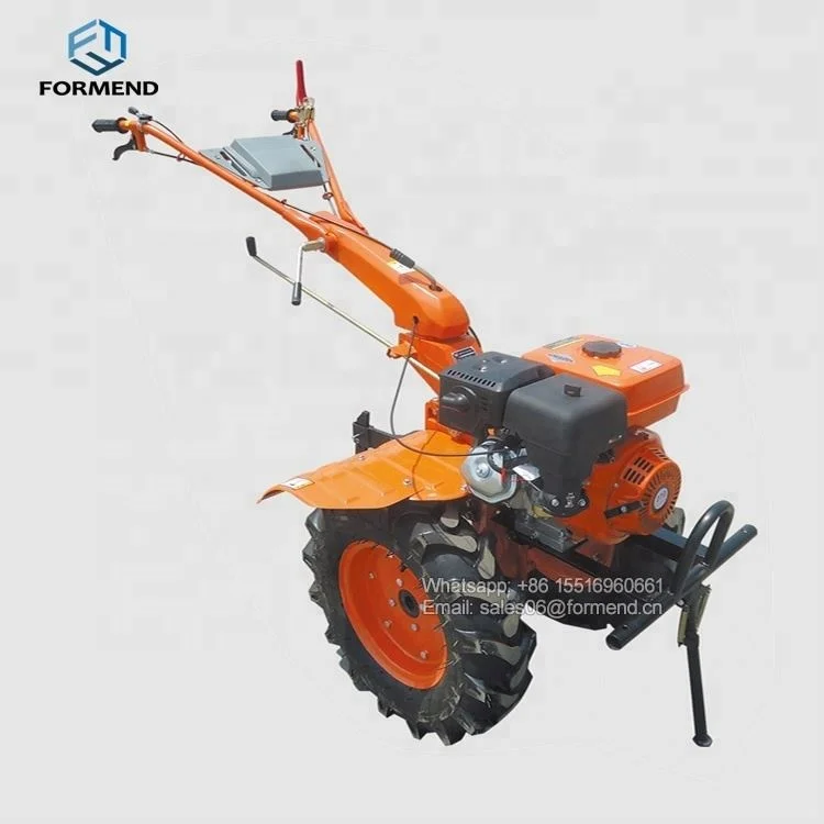 Small farm equipment motor cultivator with plough