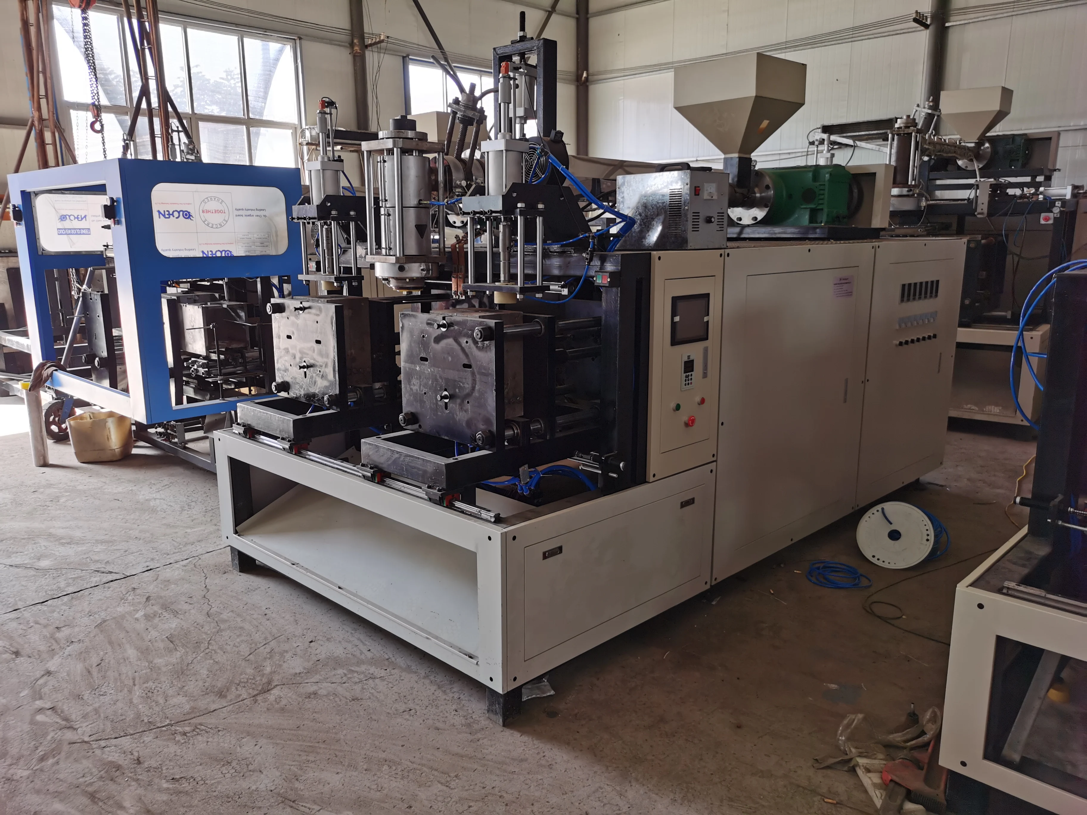 rotary preform stretch blow moulding machine