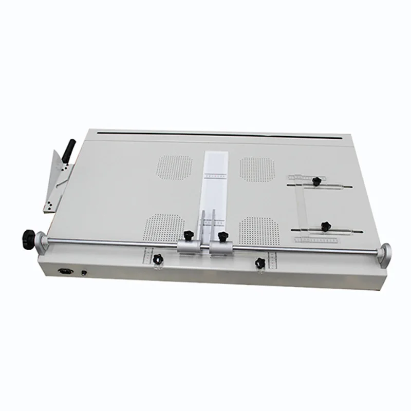 DC-100K hardcover book case machine accurately positions and forms hardcover with corner cutting and hemming