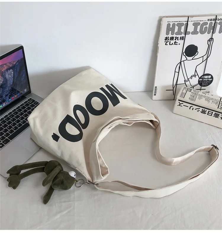 Wholesale custom printed letter shoulder bag large capacity fabric canvas zipper couple tote shoulder bag lazy style