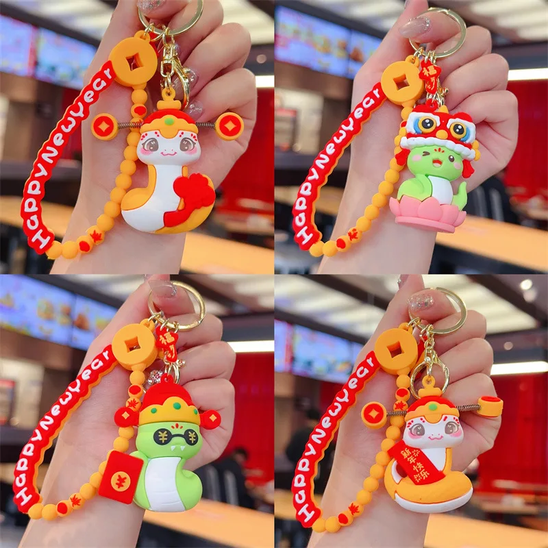 Cartoon zodiac snake key chain delicate trend God of wealth doll pendant promotional gift key chain