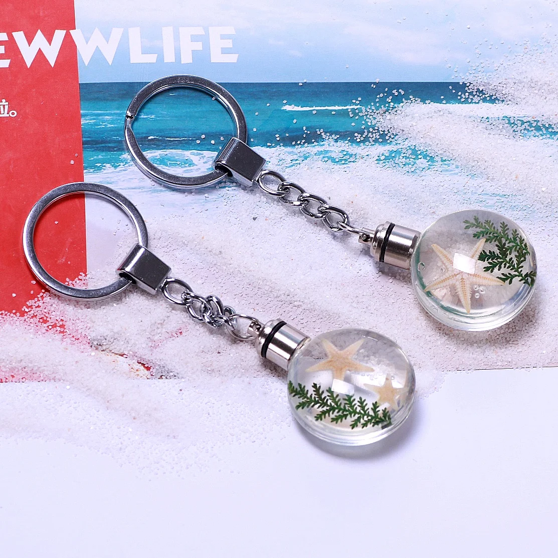 
Hot Selling Transparent LED Starfish Glass Crystal Car Key Chains 