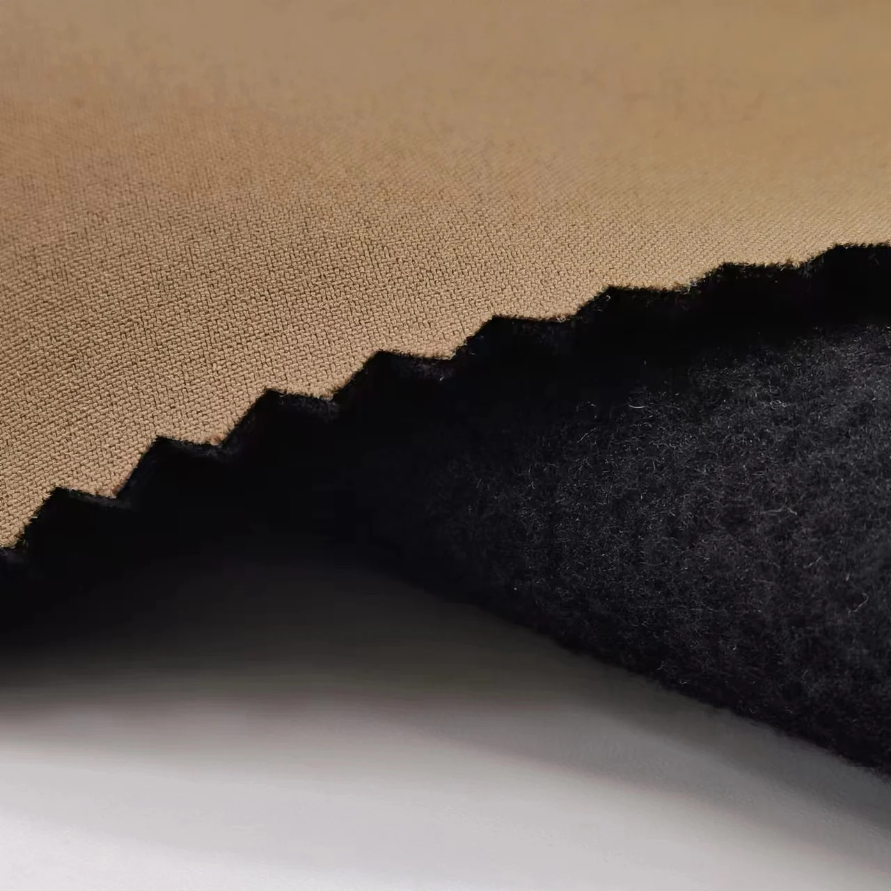 100% Polyester Softshell Plain Breathable Waterproof Windproof TPU Bonded Fleece 3 Layer Softshell Fabric For Jacket