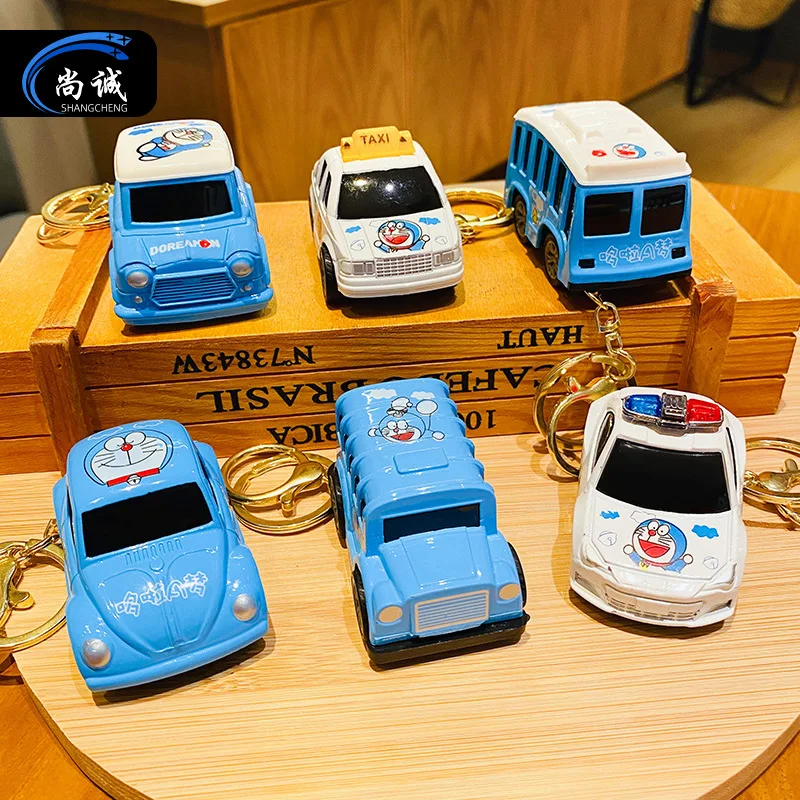 Cartoon car school bus decompression toy keychain toy wholesale