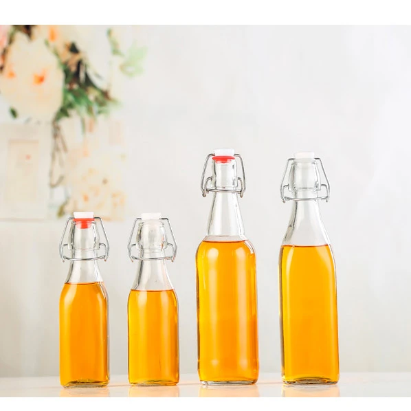 Custom Clear 500ml 750ml 1L bordeaux flat bottom swing top lid beverage beer glass wine bottle with airtight clip stopper