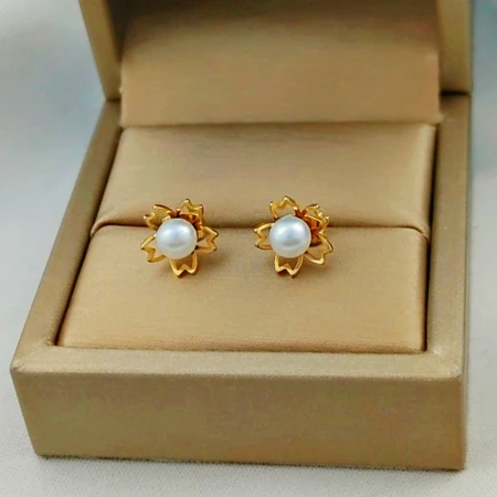 Imitation pearl earrings female hollow flower simple design high-end fashion temperament female ear jewelry