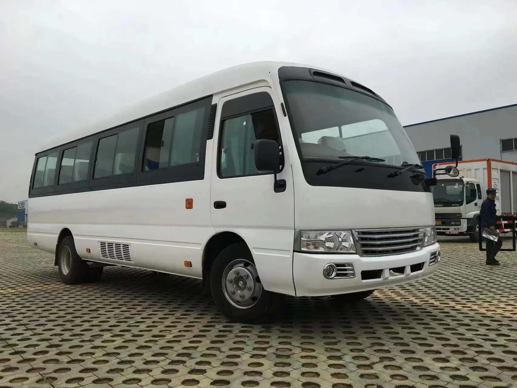 Custom Service electrical 45 Seats Closing windows and Sliding Doors Coaster Bus Toyota Coaster Passenger Bus For sale