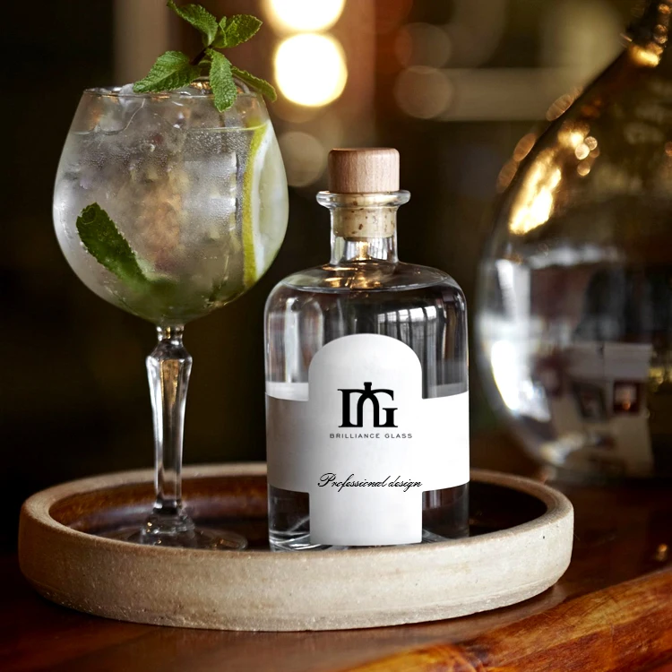 Wholesale 50ml 100ml 375mml 500ml Empty Glass Liquor Bottle Vodka Gin Bottle with Cork Gin Glass Bottle Factory