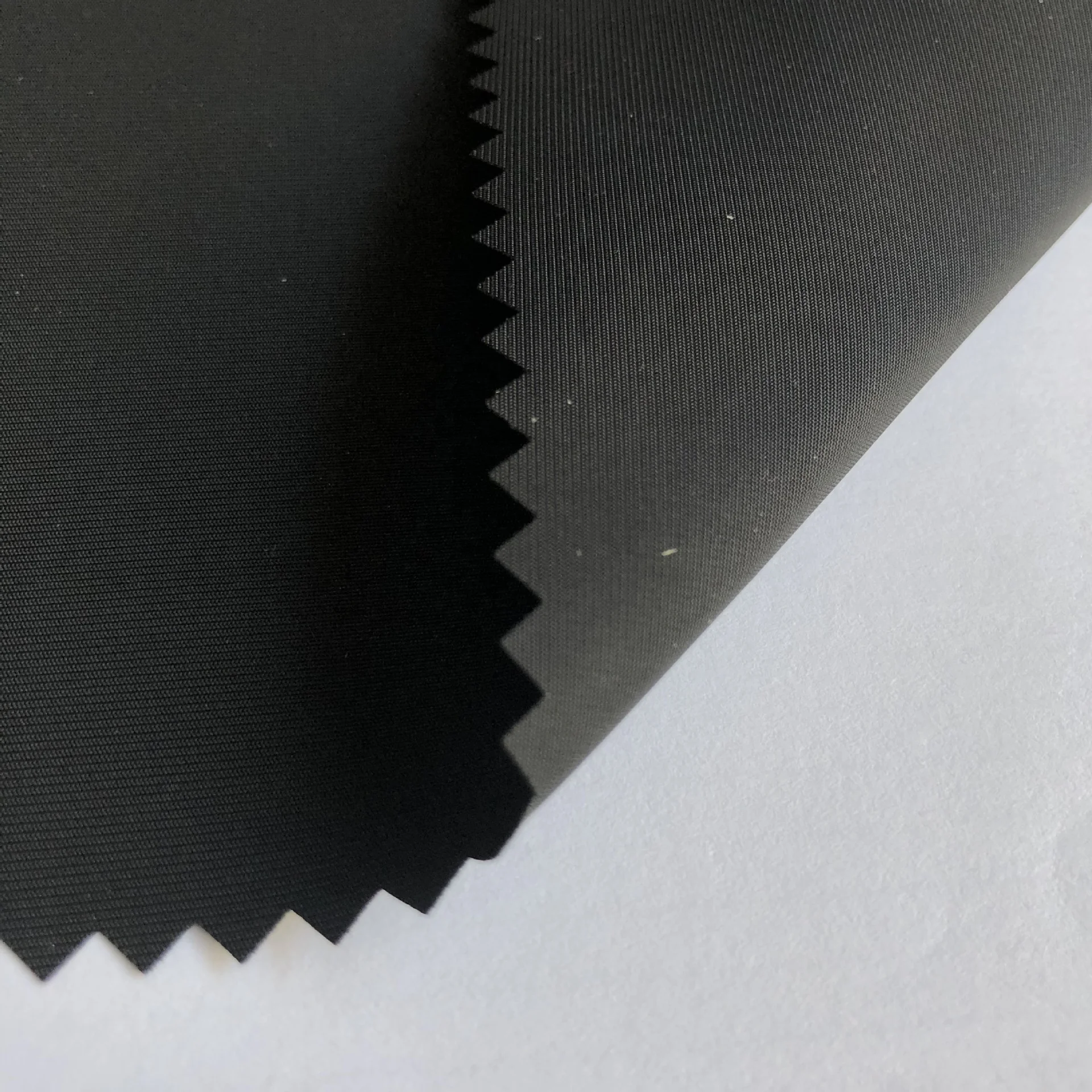 
100% Polyester 75D Imitated Memory Fabric Automan memory PU Coated Waterproof Jacket Garment Fabric 