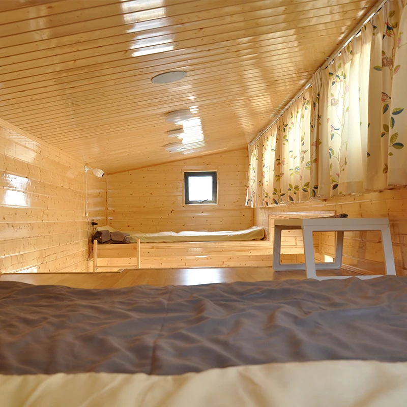 Mountaineer Ready Made Steel Frame Prefab Tiny House With Trailer on Wheels WPC Board Wall