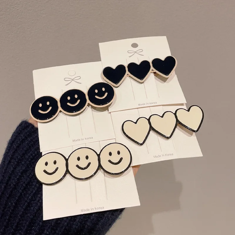 Оптовая продажа 2023 горячий дизайн ацетатные белые черные улыбающиеся сердца для девочек челки украшение утка бис зажим