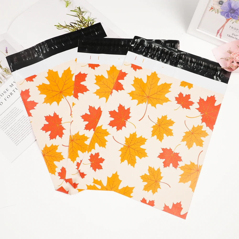 22024 high-end custom brand logo maple leaf pattern courier bags in stock 25.5*33+4cm