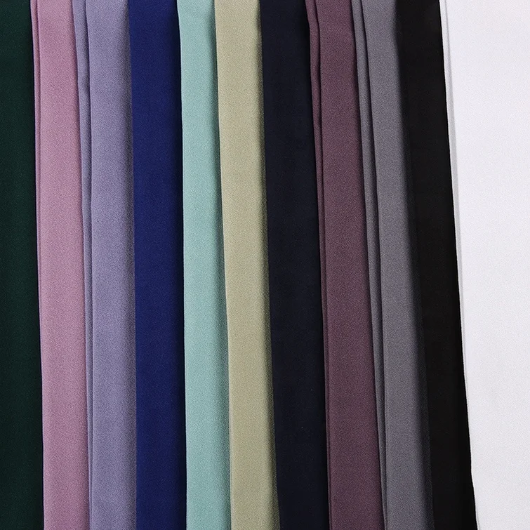 cheap price dubai fabric 100 polyester 4 way spandex textured moss crepe plain fabric online