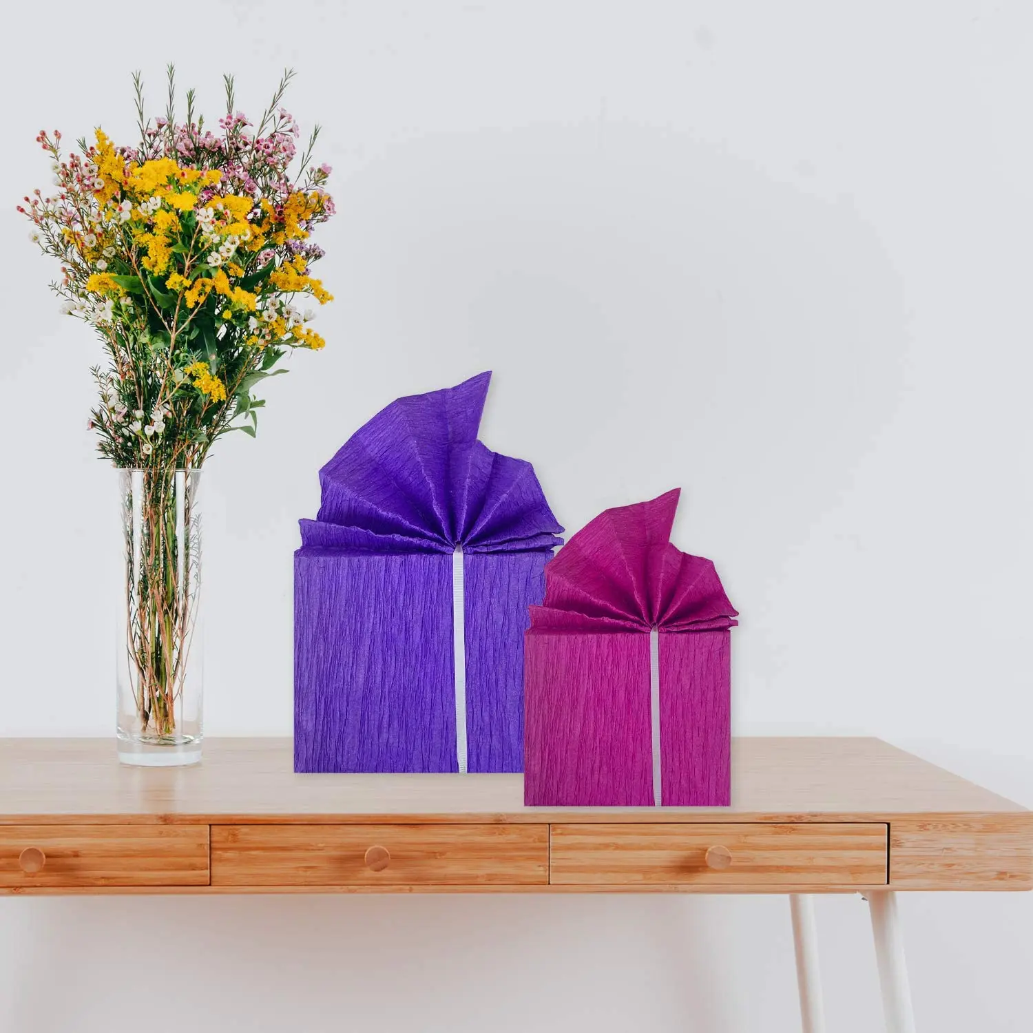 
wrapping colorful crepe paper roll 