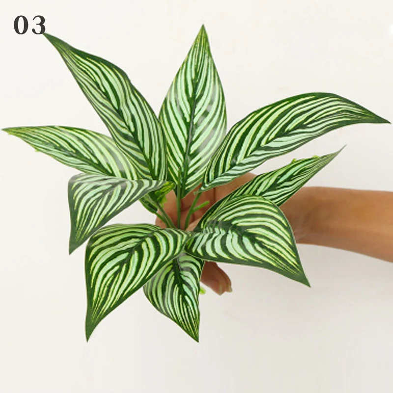 
2021 Artificial plant background wall plastic potted flower arrangement leaves wedding road guide fake flower plant pepper grass 