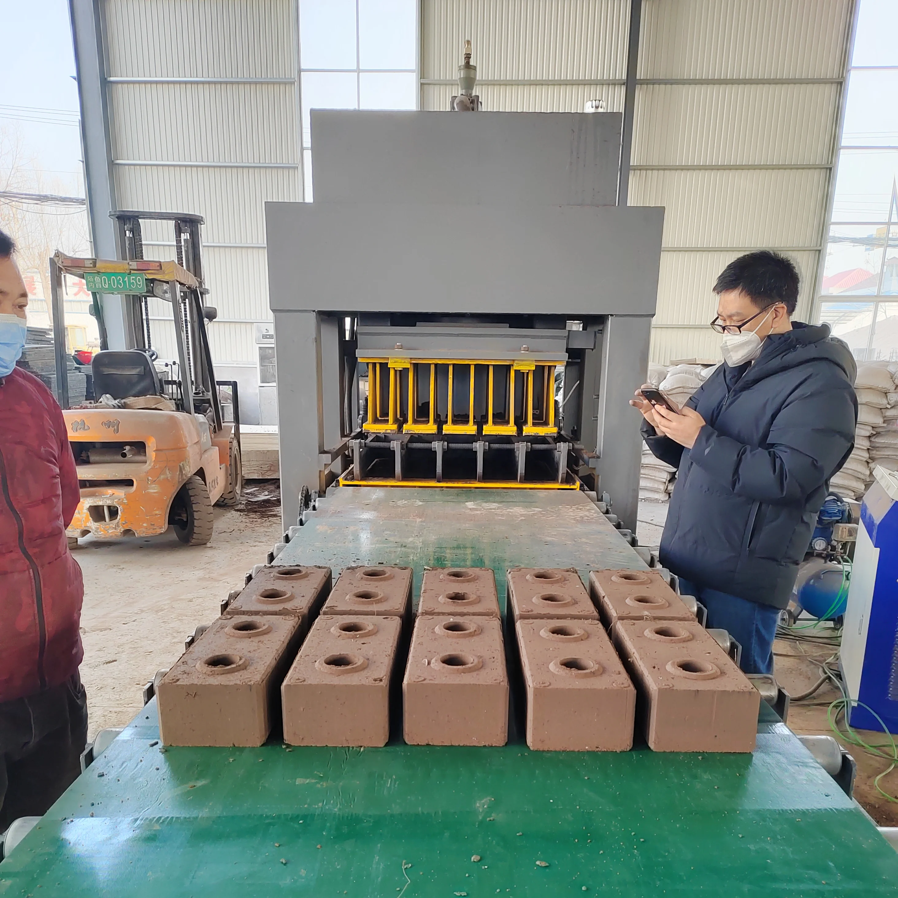 10-10 Hydraulic Interlocking Clay Brick Machine 10-10 Compressed Earth Soil Fly Ash Clay Brick Molding Machine