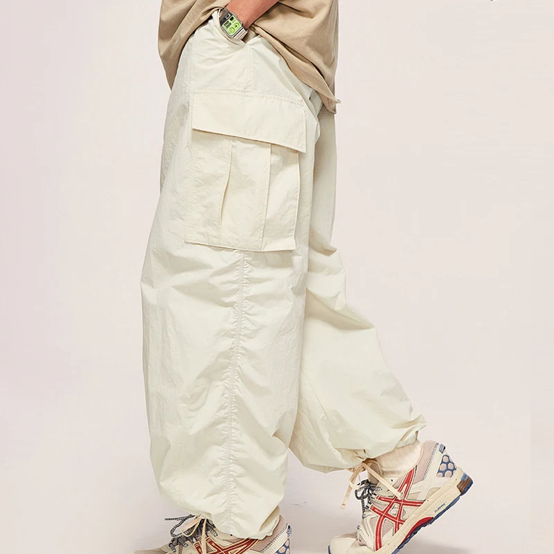 Custom logo 290gsm 100%nylon Baggy Pants Cargo Pocket Windbreak Fabric Trouser Pants Parachute Pants Men