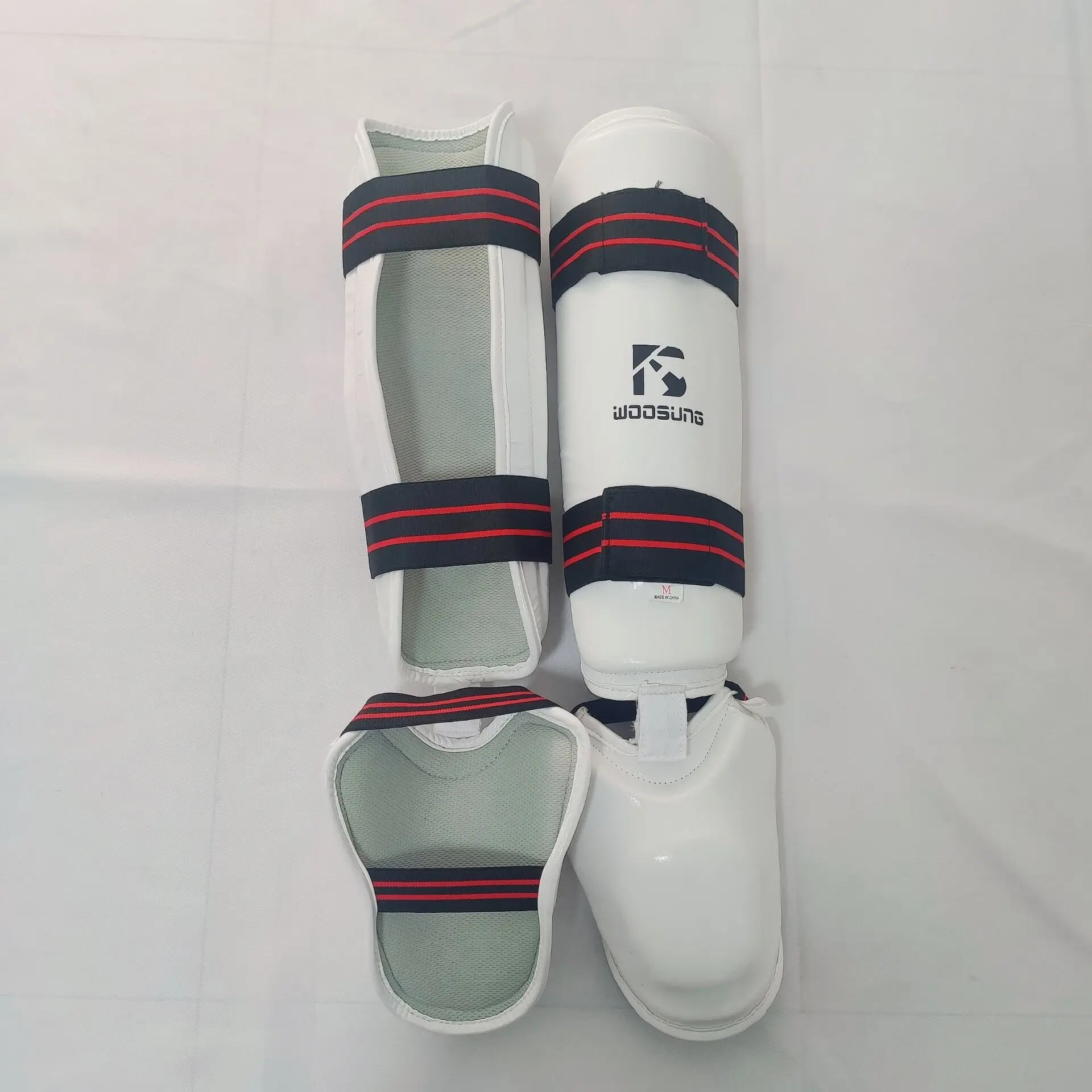 Sample free shipping Wholesale WOOSUNG leg protection equipment in factory including foot boxing Taekwondo karate shin guards