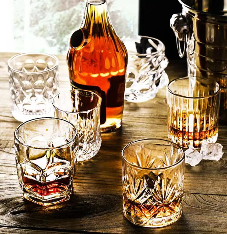 Jinbaijia custom unique shape high quality fancy sublimation round clear carved flat bottom glass whisky glass cup