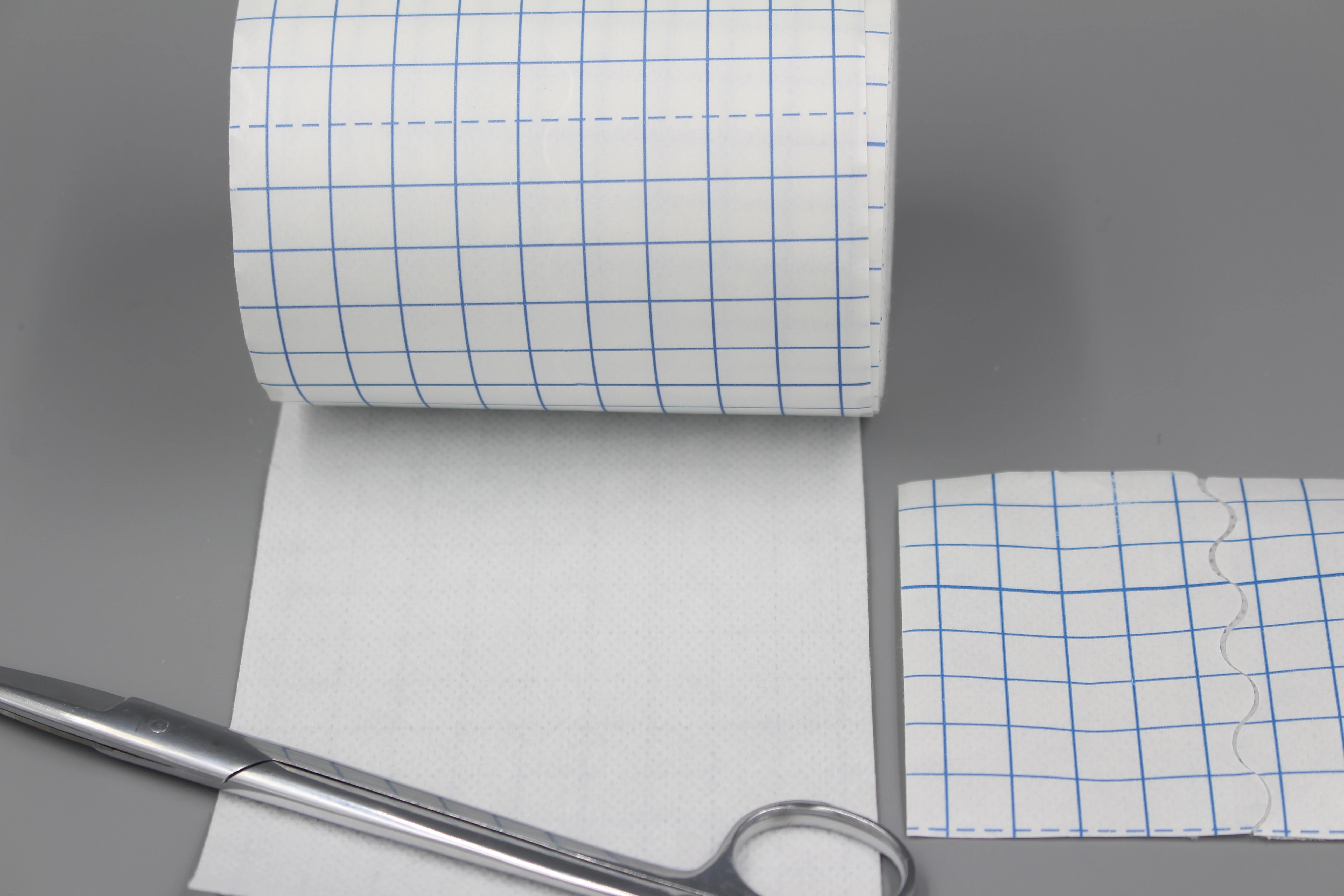 Bulk sale Non-Woven Cover Stretch Tape  Bandages Breathable adhesive Wrap Bandages fixing tape jumbo Roll factory