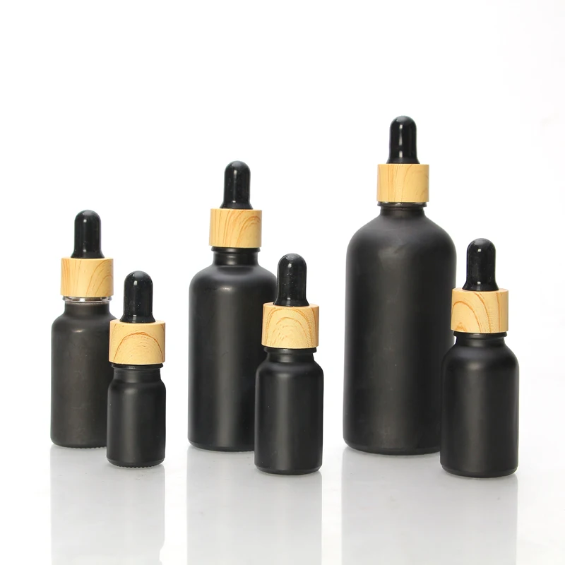 Custom Empty 5Ml 10Ml 15Ml 20Ml 30Ml 50Ml 100Ml Frosted Glass Round Hair Oil Essential Oi Dropper Bottle With Grained Lid