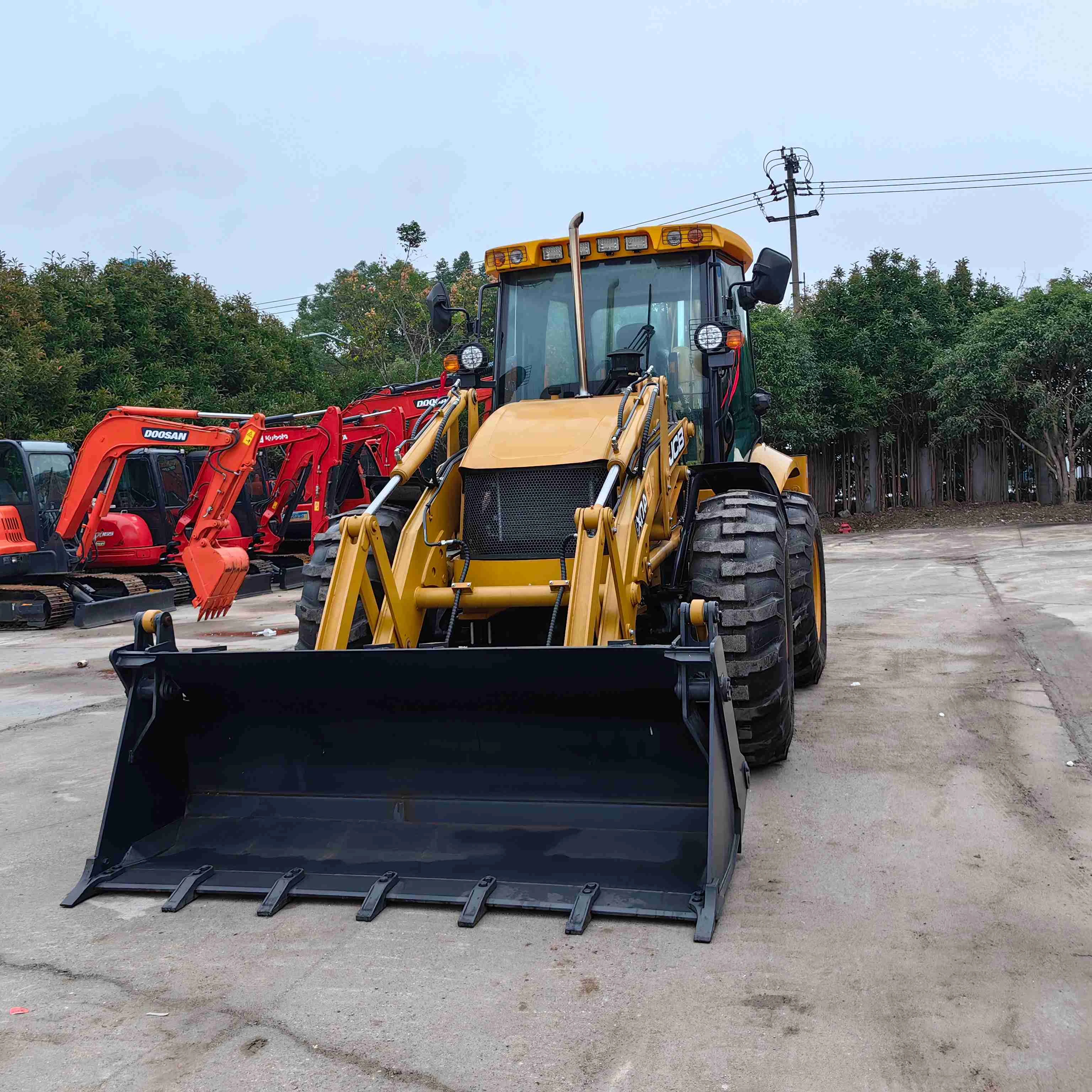 Экскаватор-погрузчик JCB 4CX 3cxr со скидкой по низкой цене