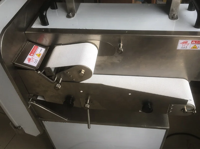 Automatic chicken legs cutter equipment /rib cutting machine Frozen meat cutting machine with bone