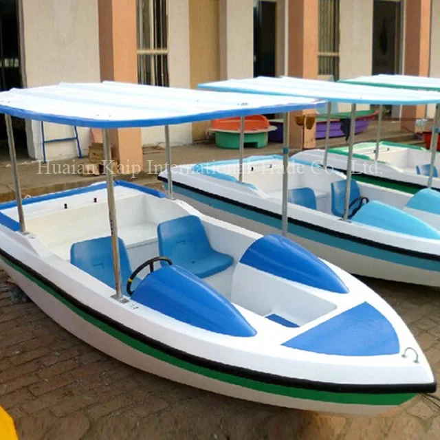 Direct sale 500w electric fiberglass and stainless steel boat battery fiberglass boat with safety fence for kids play