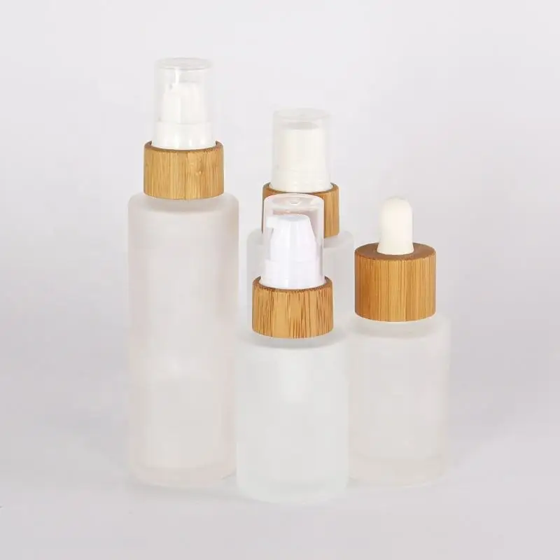 Orgontic New Developed Frosted Wooden Bamboo Cap Round Transparent 10ml 30ml 50ml Glass Bottle With Lotion Pump
