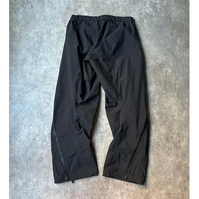New Custom High Quality Man Black Loose Oversize Zipper Open Bottom Baggy Winbreake  Nylon Polyester Track Pants For Men