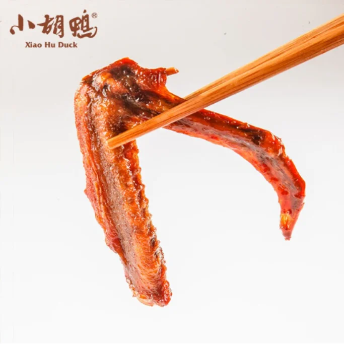 Factory Price 90g Non Spicy Crispy Xiao Hu Duck Wings Asian Supplier Chinese Food Snacks