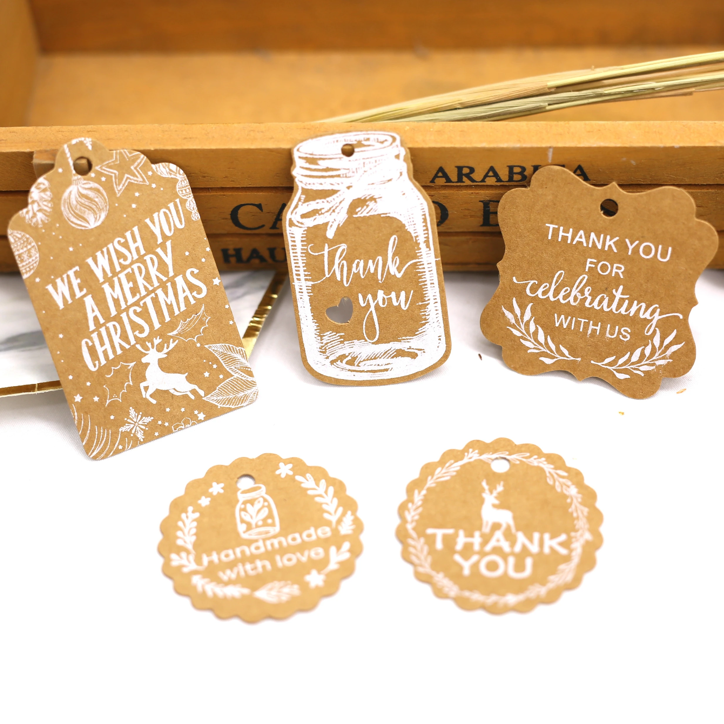 Die cut Christmas kraft paper hang tag customized luxury printed logo clothing seal tags