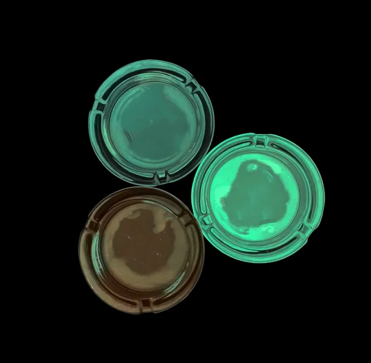 
Factory direct sales custom logo Glass ashtray round ashtray with mouth cartoon stick Fluorescent smoking ashtray 