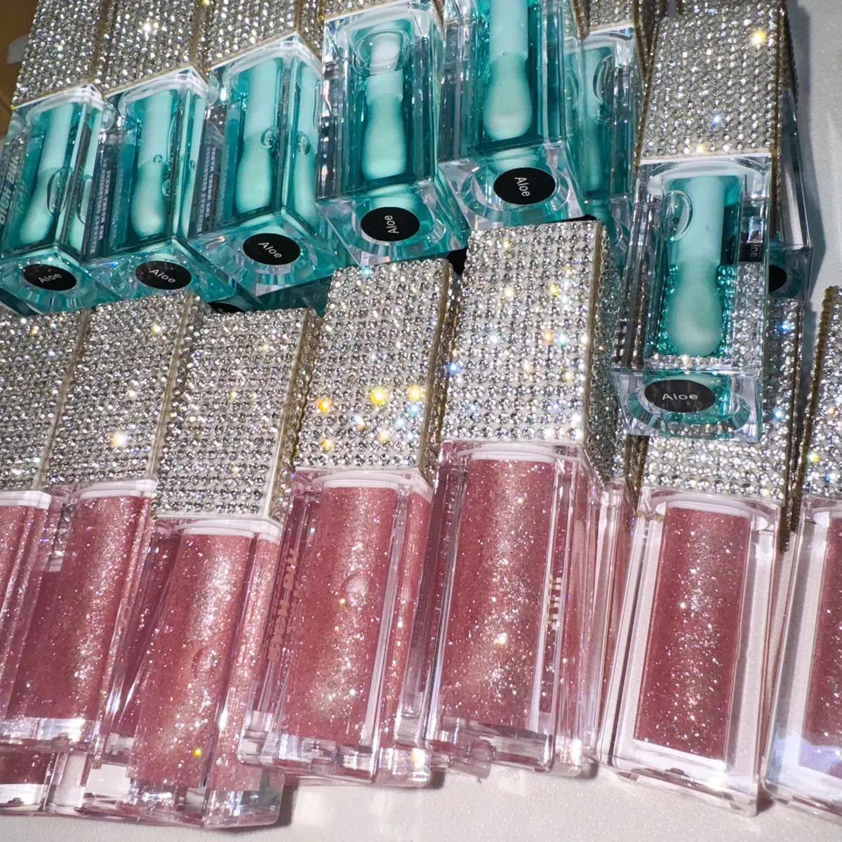 Wholesale plumping liquid layer lip care oil custom logo vegan clear moisturizing scented flavored glossy fat lip oil