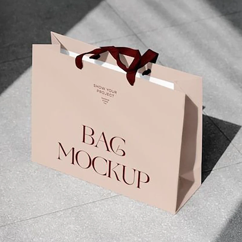 Wholesale custom white card board paper gift bag with custom logo with ribbon handle