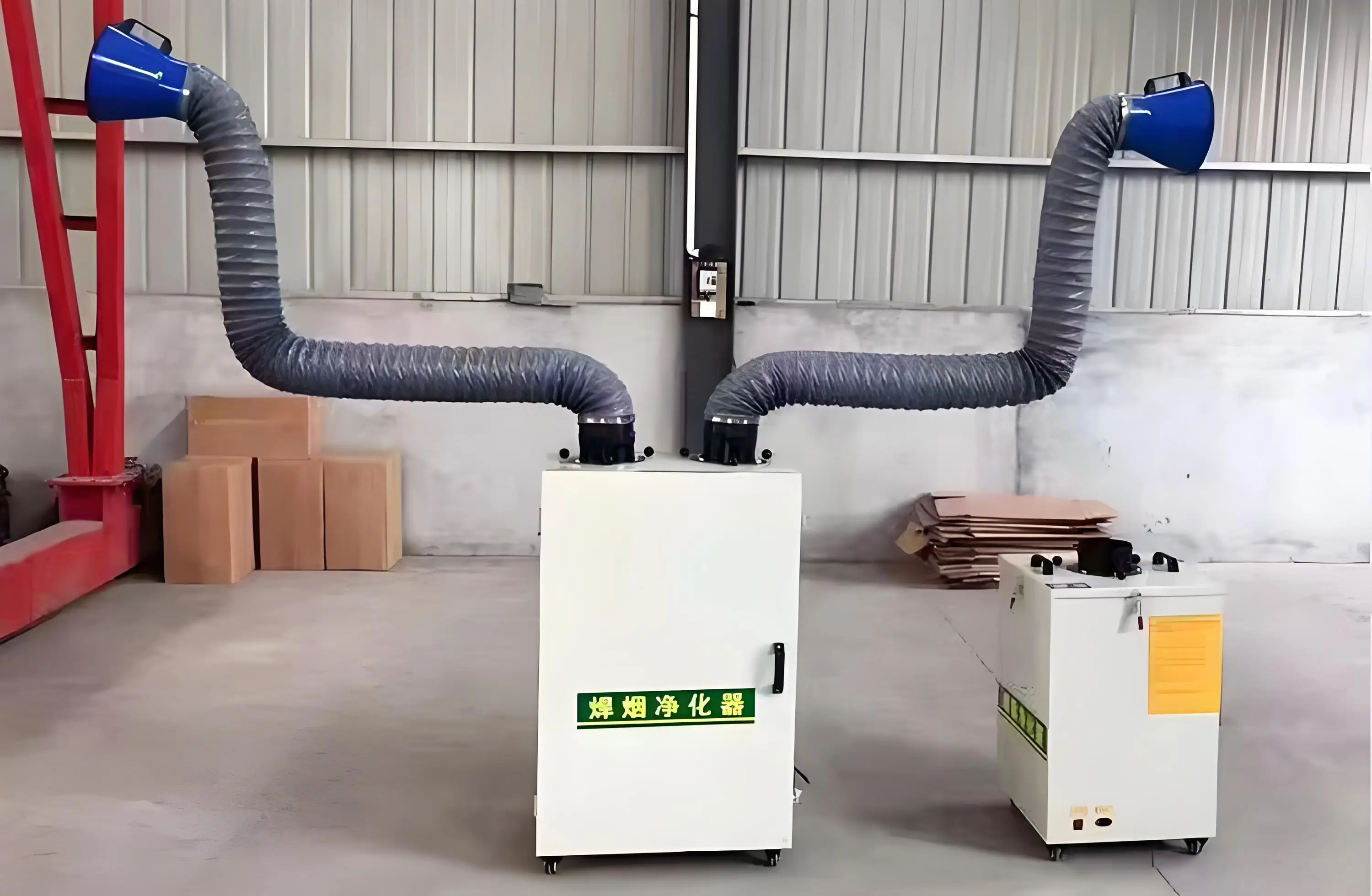 Portable welding fume extractor for welding fume collection in metal fabrication manufacturing plant